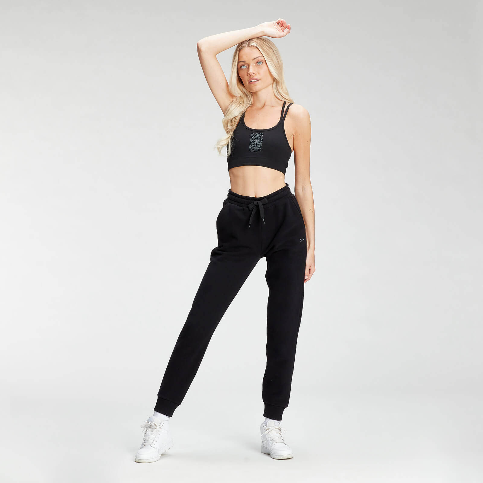 Brassière de sport à imprimé répétitif MP pour femmes – Noir