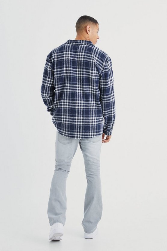 Slim-Fit Schlagjeans mit Rissen