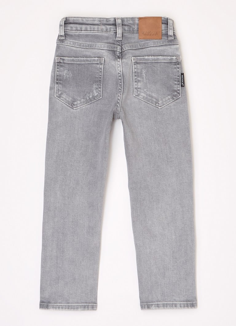 Jeansy Glennis z prostą nogawką od Retour Jeans, z przetarciami.