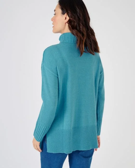 Pull col roulé à torsades