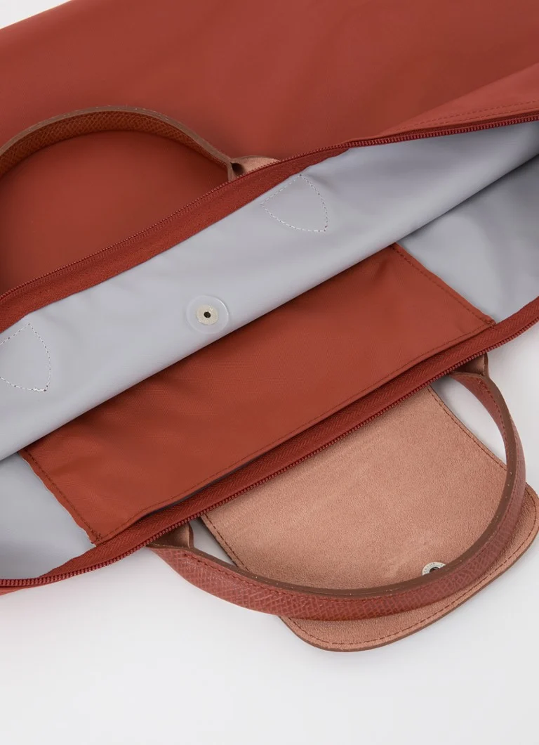 Bolsa de fim de semana Longchamp Le Pliage Green S com detalhes em couro.