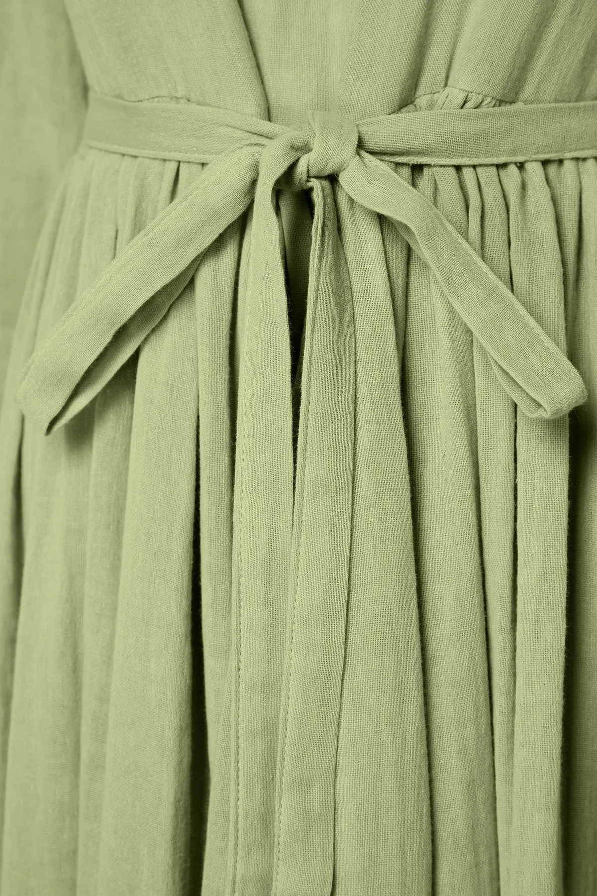 Trendyol Modest  Khakifarbenes, bequem geschnittenes, gefüttertes Musselin-Kleid aus 100 % gewebter Baumwolle mit Gürtel TCTSS23EB00048