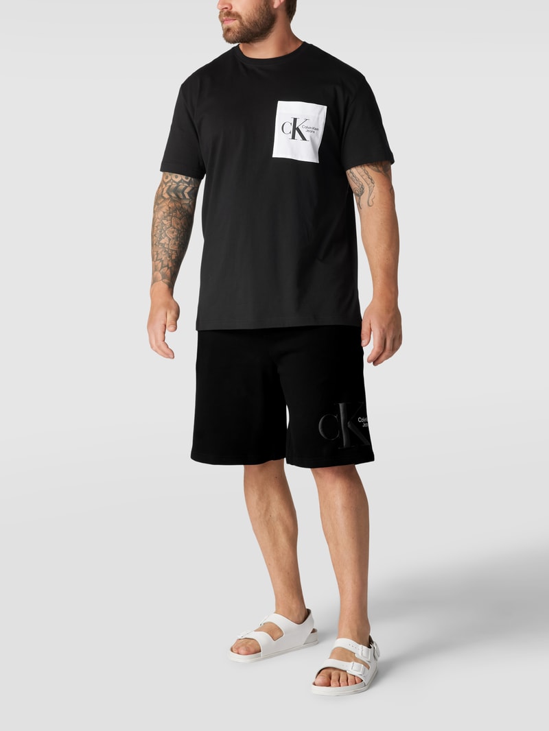 PLUS SIZE Sweatshorts mit Label-Print Modell 'PLUS DYNAMIC' in schwarz