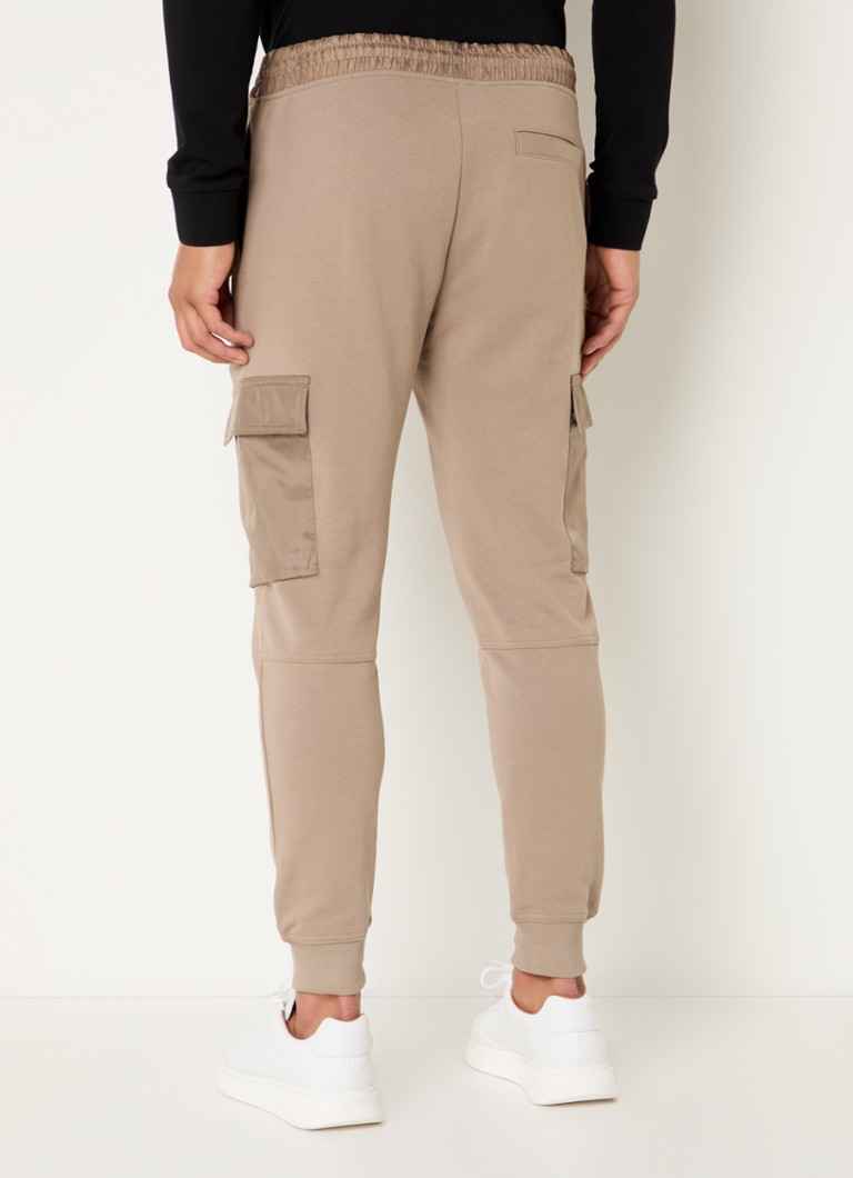 Pantaloni de trening HUGO BOSS slim fit cu buzunare cu clapă