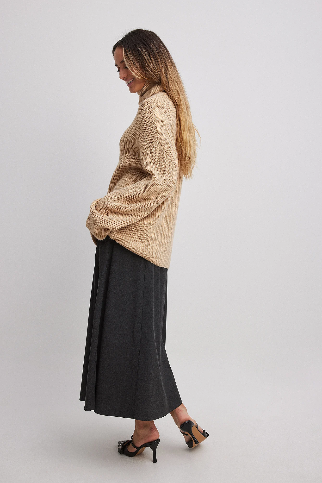Langer Rollkragen-Strickpullover