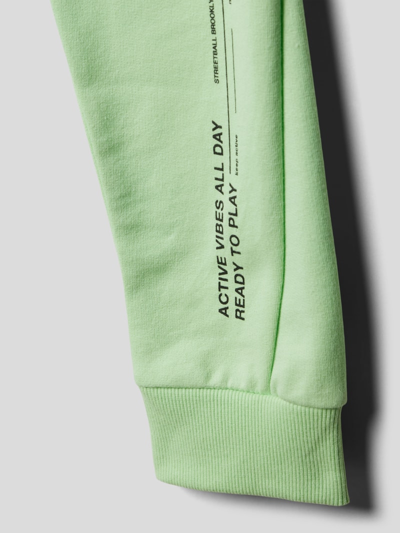 Sweatpants mit Statement-Print in hellgrün