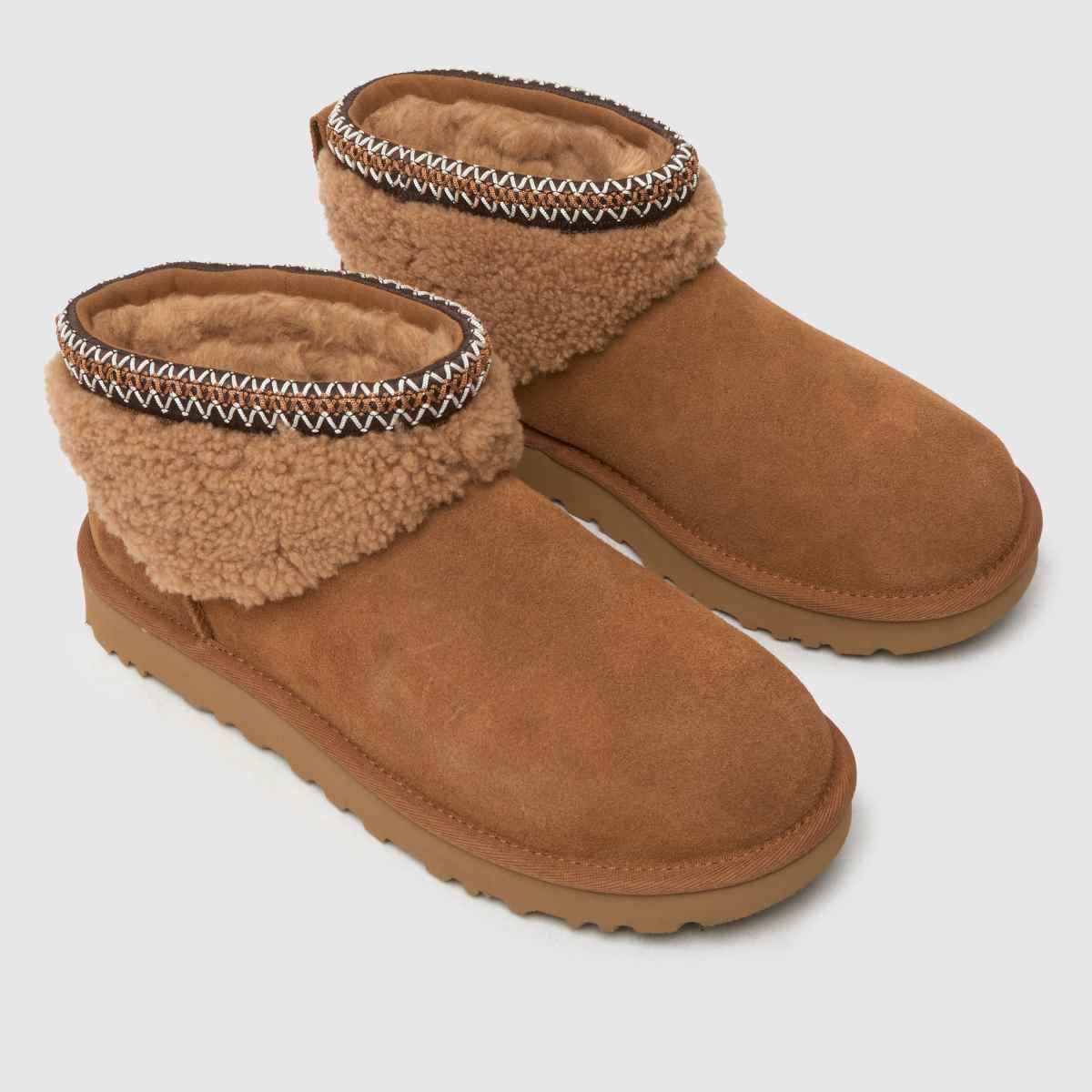 UGG – Classic Ultra Mini Maxi – Kastanjebruna stövlar med lockmönster