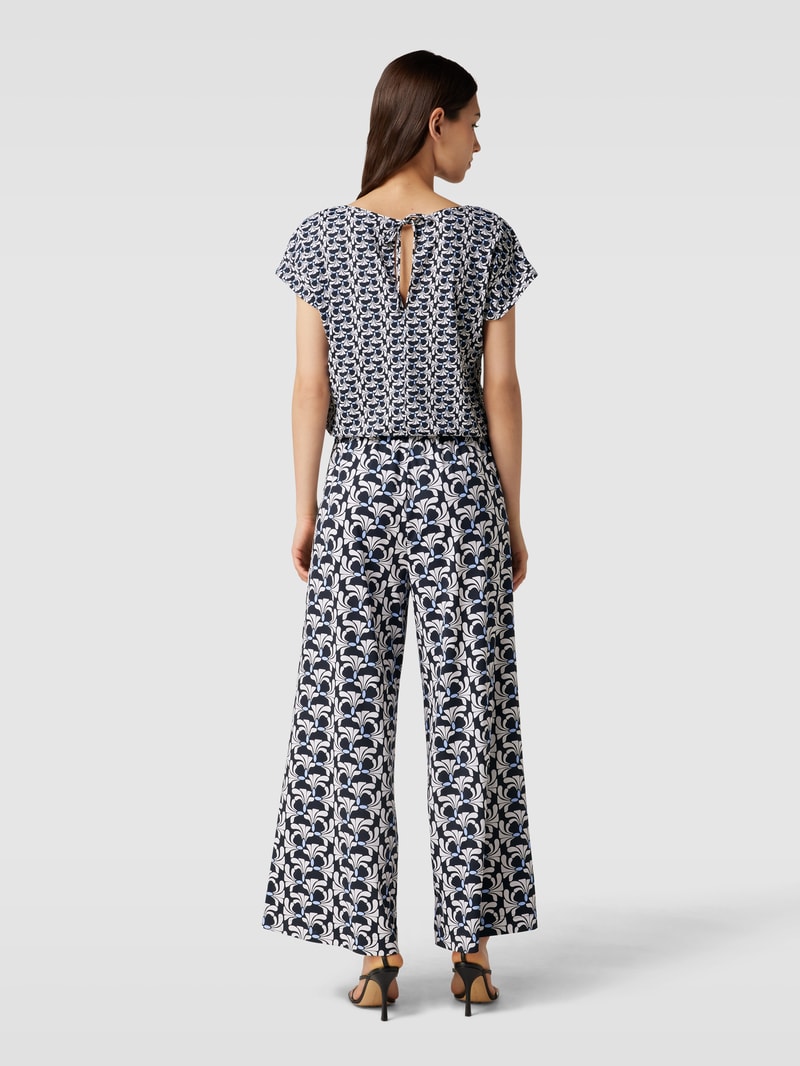 Jumpsuit mit Allover-Muster in blau