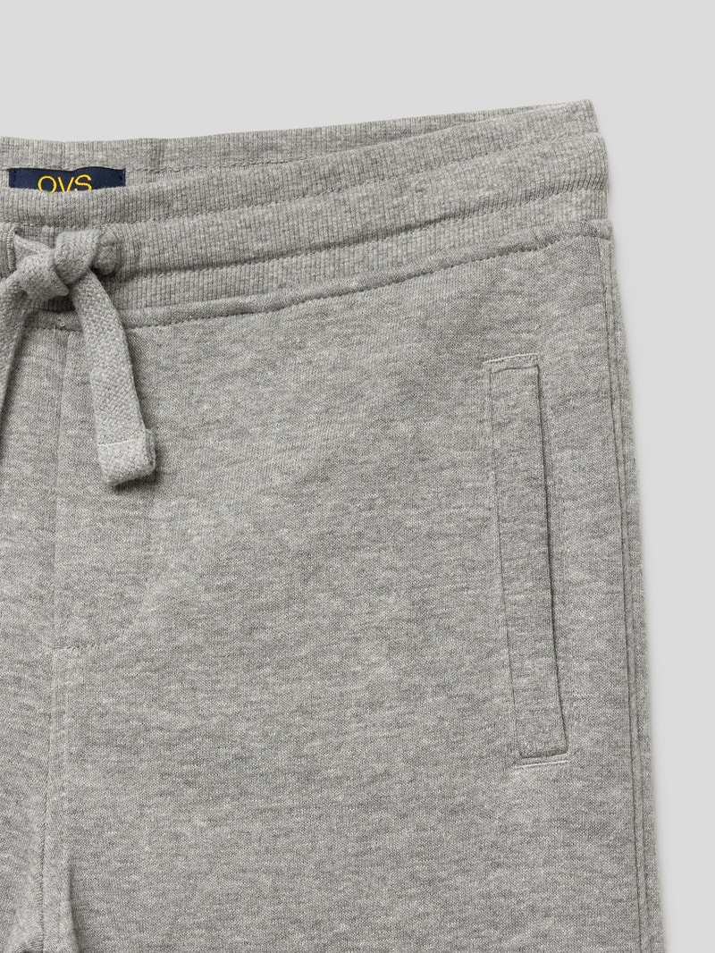 Sweatpants mit seitlichen Eingrifftaschen in mittelgrau meliert
