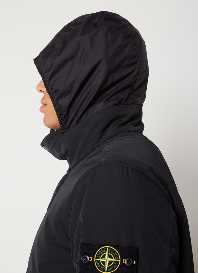 Μονωμένο μπουφάν Stone Island 43726 με πλαϊνές τσέπες και πτυσσόμενη κουκούλα