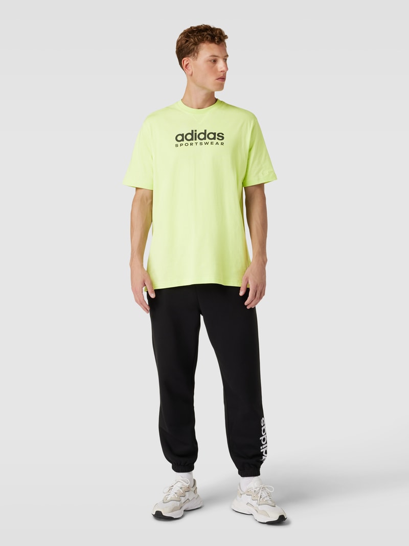 T-Shirt mit Label-Print in neon gelb