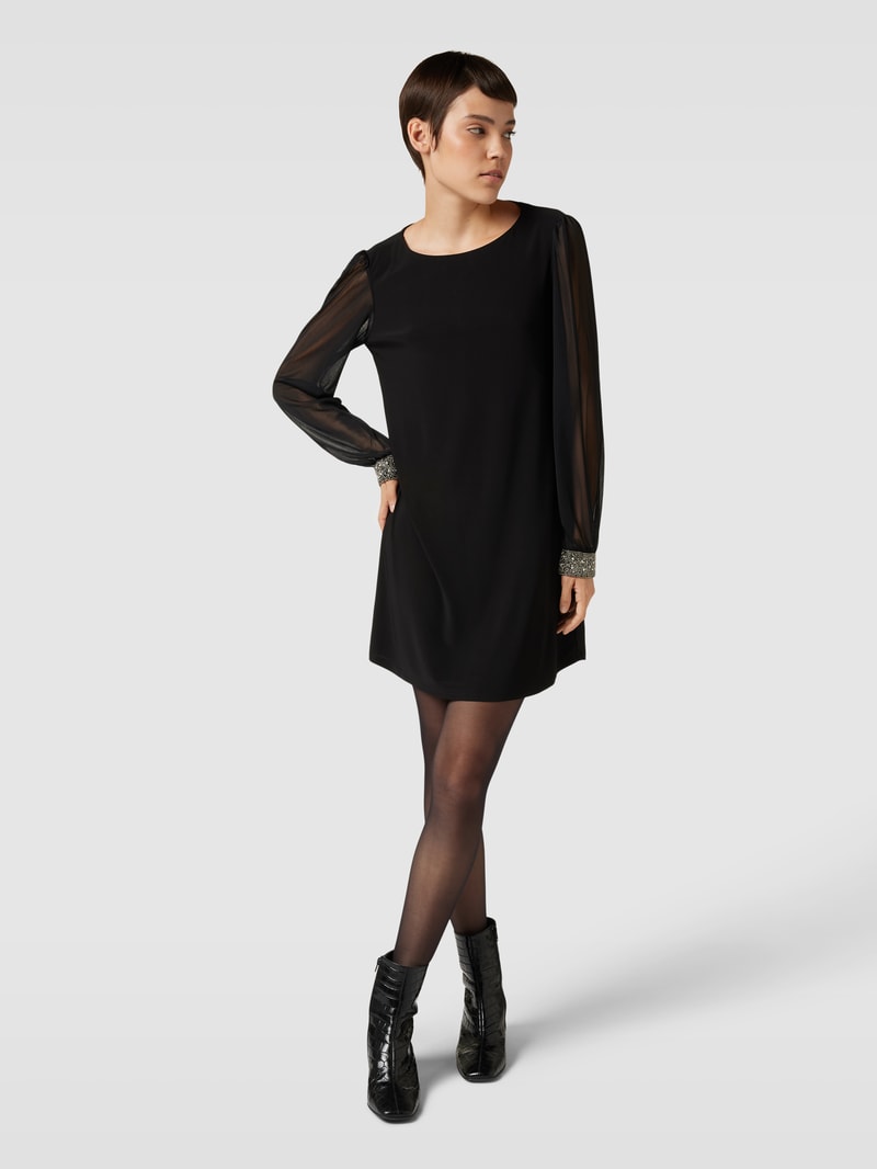 Minikleid mit semitransparentem Besatz in schwarz