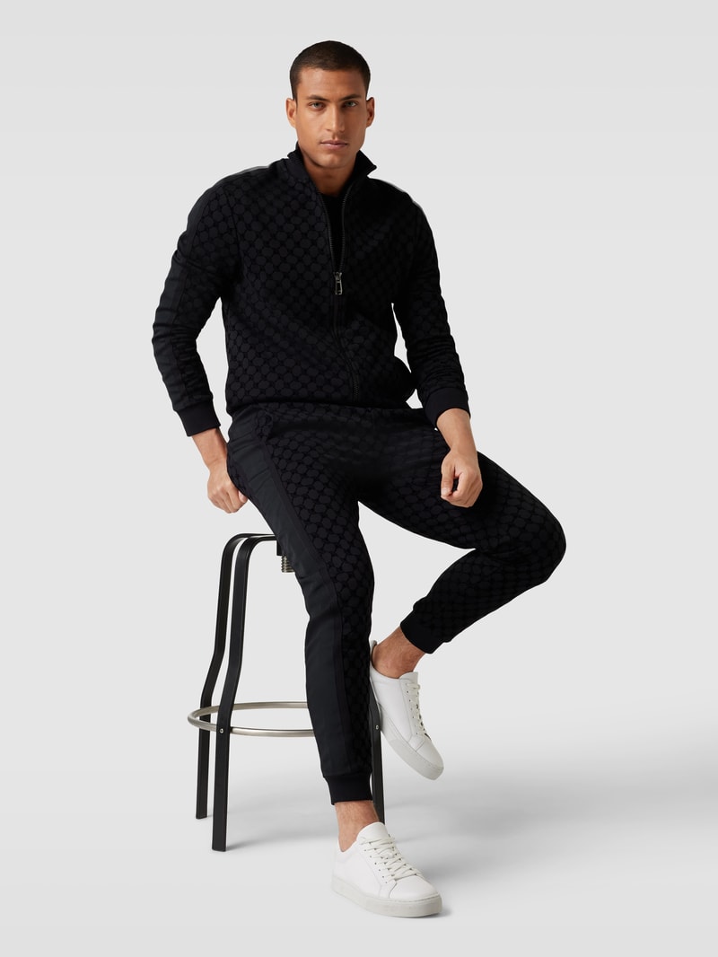 Sweatpants mit Allover-Label-Print in schwarz