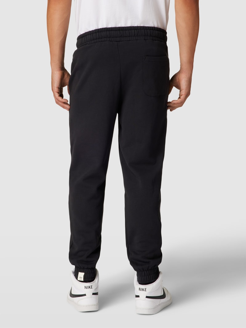 Sweatpants mit Label-Print in schwarz