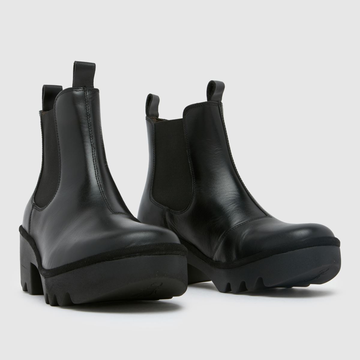 Fly London – Svarta chelseaboots med klack och triangelmönster