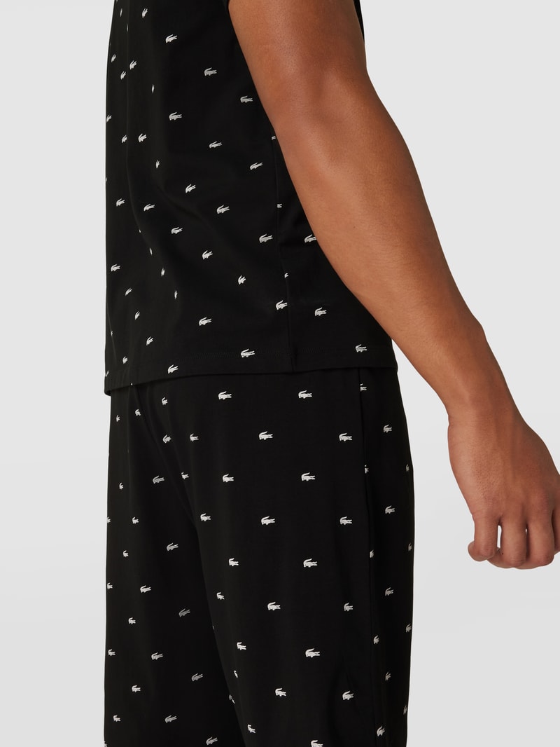 Pyjama mit labeltypischem Allover-Print in schwarz