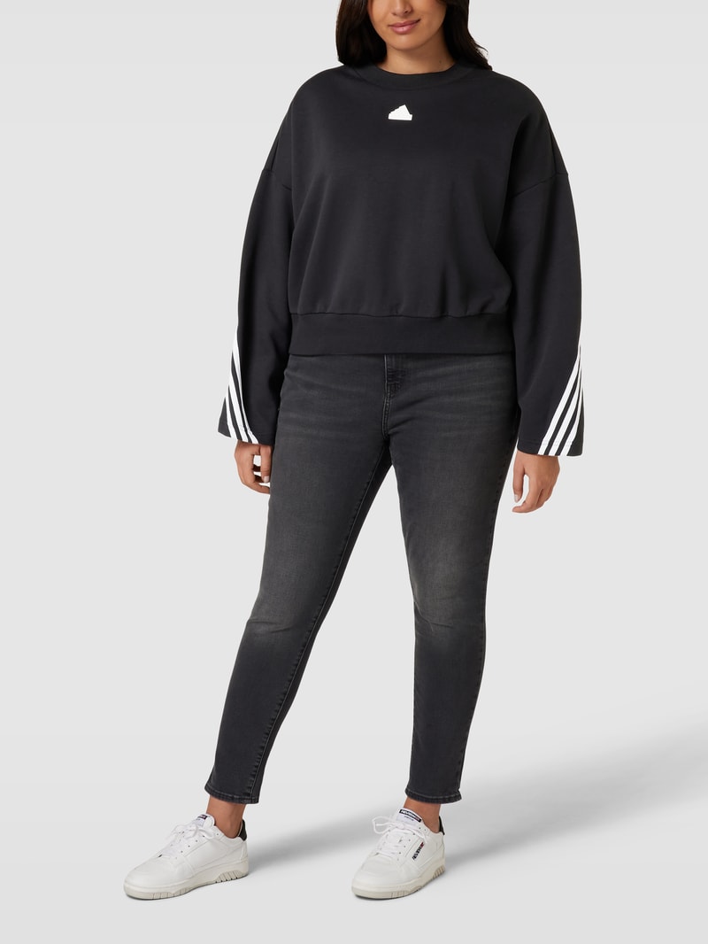 PLUS SIZE cropped Sweatshirt mit Logo-Applikation in schwarz