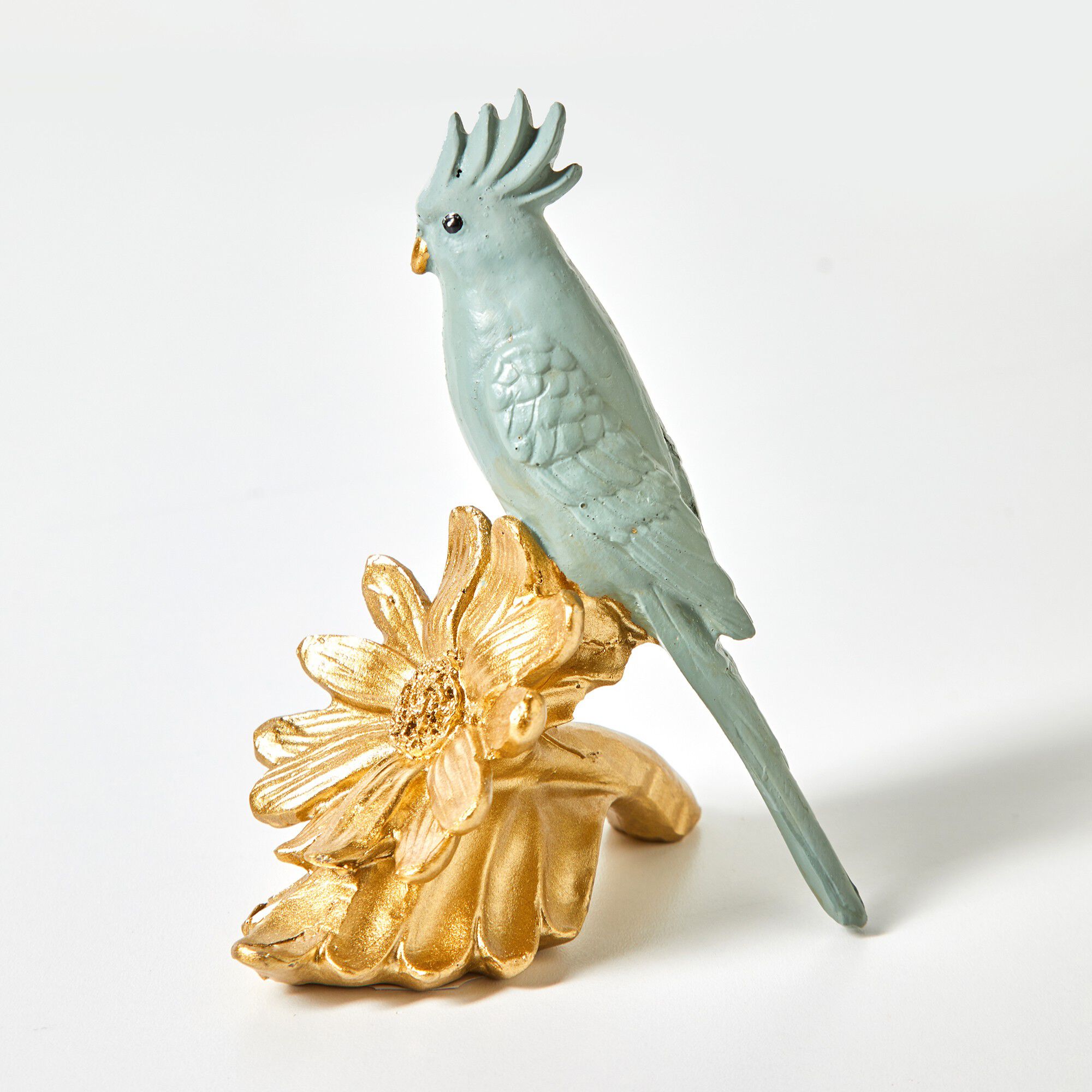 Statuette perroquet sur fleur dorée