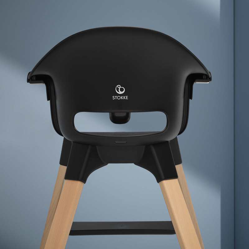 Chaise haute Clikk noire pieds bois Stokke