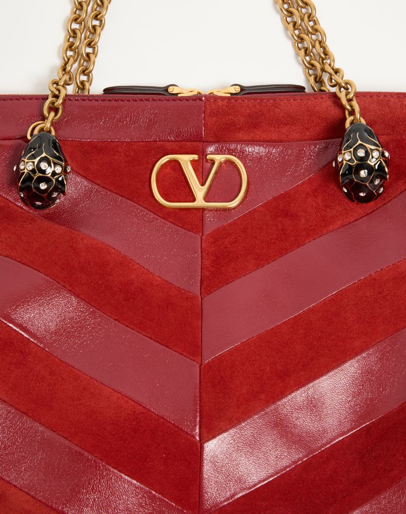 Bolsa de ombro média Valentino Garavani Panthea em camurça e napa com estampa chevron