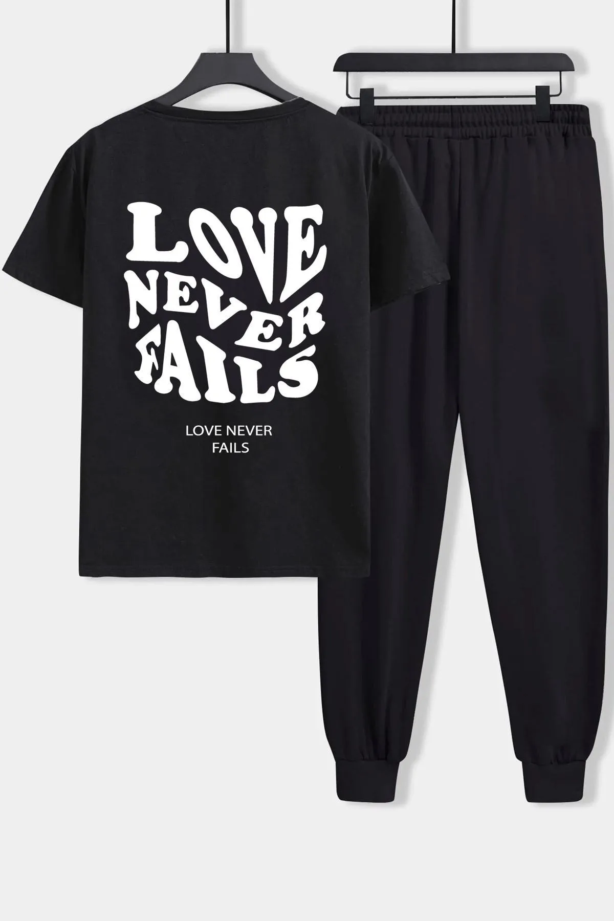uyguntarz  Zweiteiliges Unisex-Trainingsanzug-Set „Love Never Fails“.