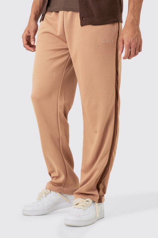 Lockere Trikot-Jogginghose mit Homme-Stickerei