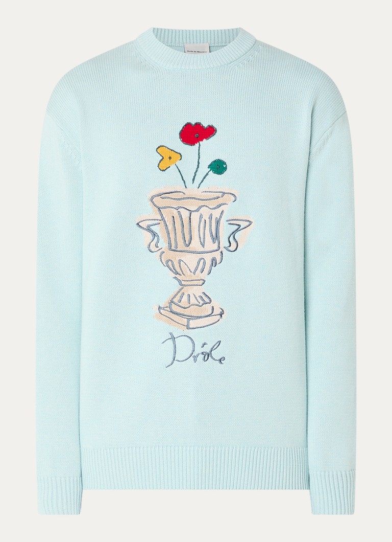 O vază interesantă din amestec de lână cu broderie, realizată din lână groasă de Mr. Knit.