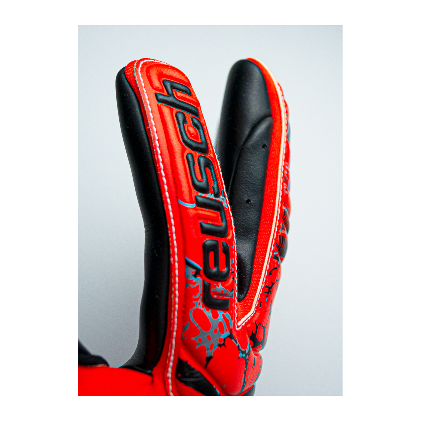 Reusch Attrakt Gold X 2023 TW-Handschuhe Rot Blau Schwarz F3333