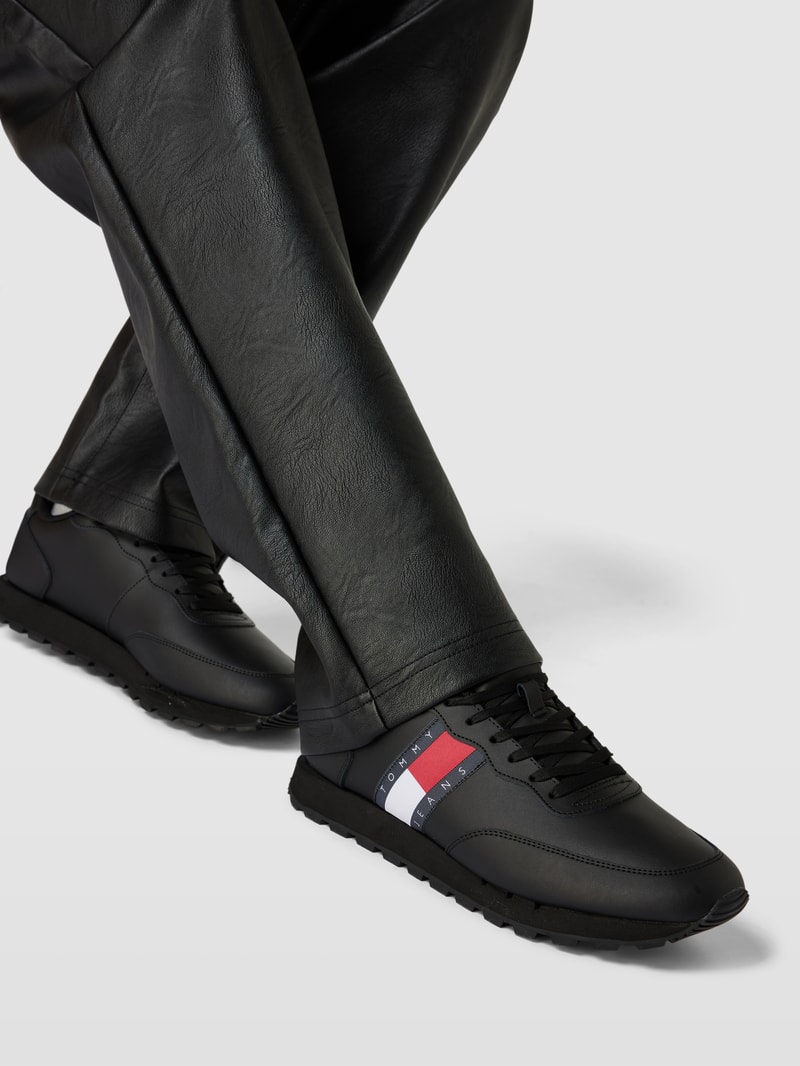 Sneaker mit Label-Details Modell 'TOMMY JEANS LEATHER RUNNE' in schwarz