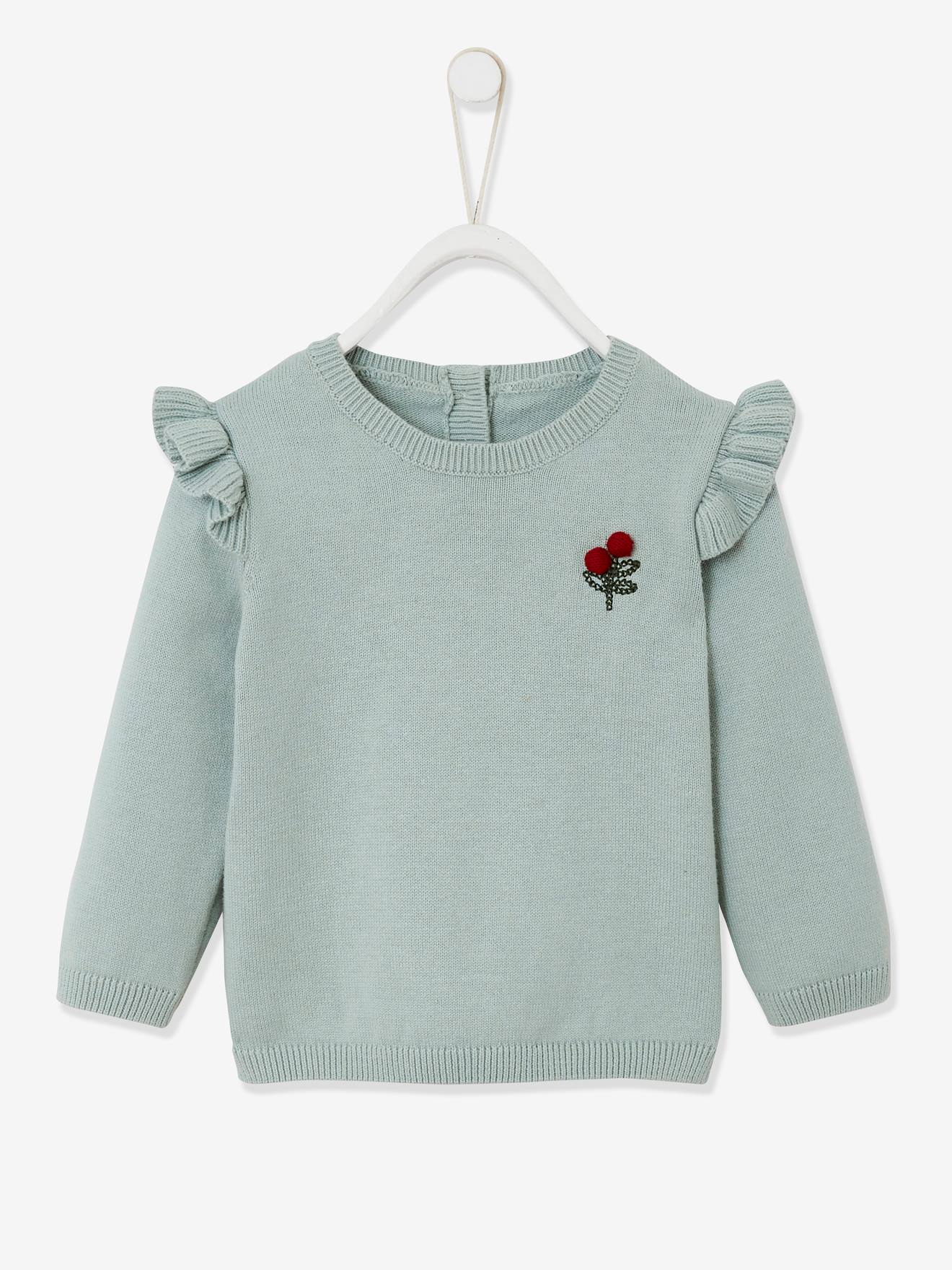 Pull à volants cerise bébé avec pompons rose