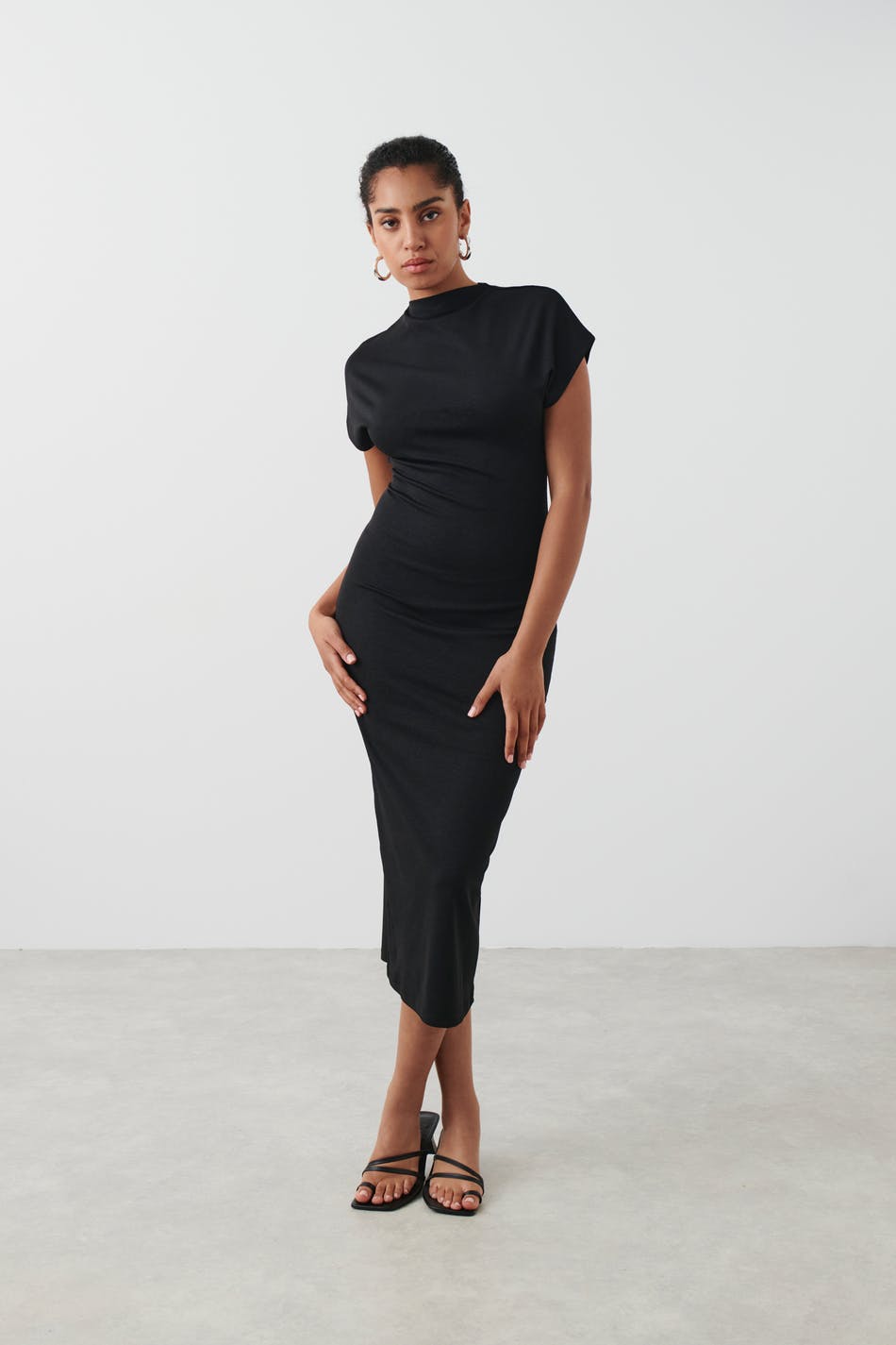 Open back funnel neck dress
