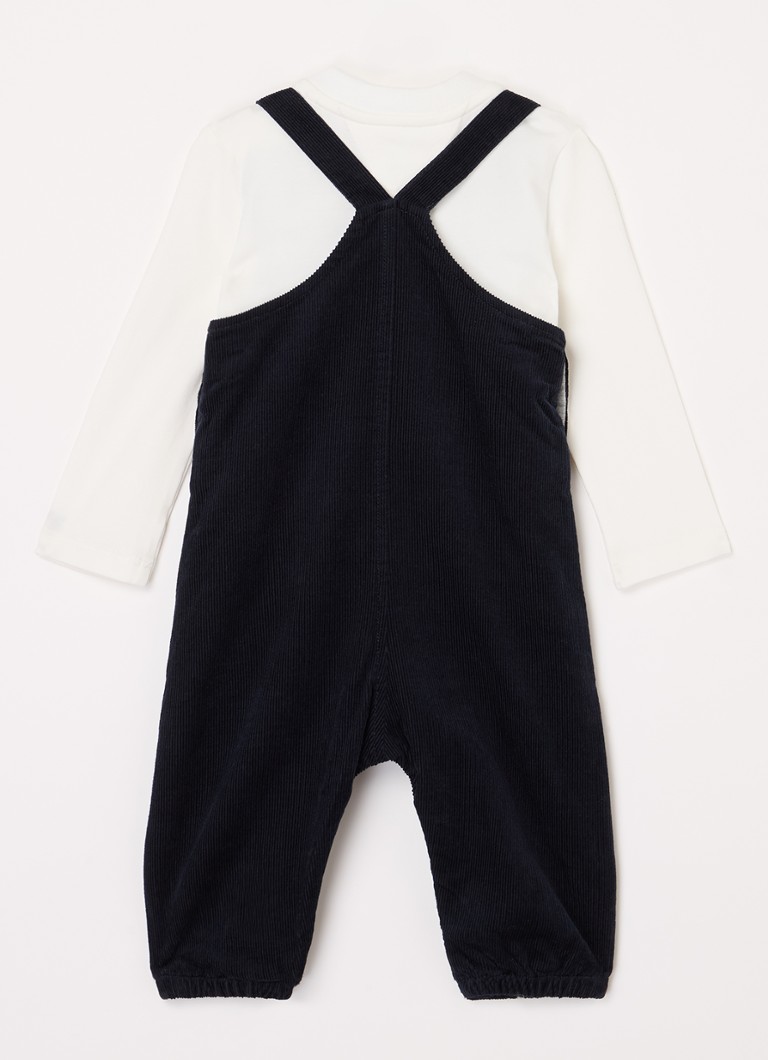 Set din două piese Tommy Hilfiger, format dintr-o salopetă și o cămașă cu mânecă lungă.