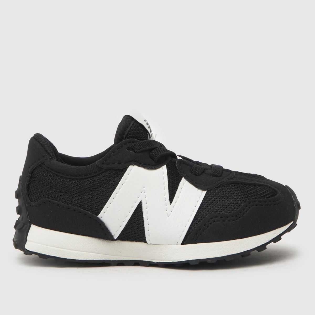 New Balance svarta och vita 327 småbarnsskor