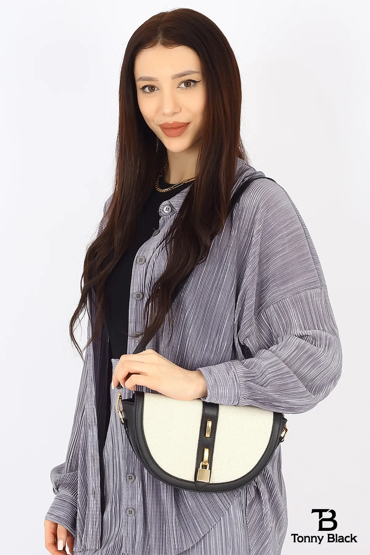 Tonny Black  Original Cross Strap Schwarz Creme Kontrast Design Stilvolle minimalistische Hand- und Schultertasche mit Schloss-Accessoire