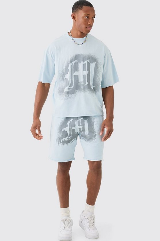 Kastiges Oversize T-Shirt mit Graffiti-Print und rohem Saum