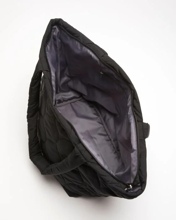Sac matelassé forme besace