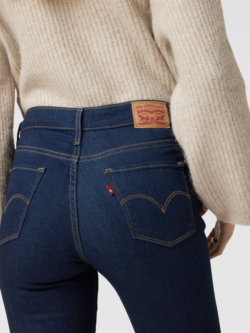 Jeans mit Label-Patch Modell 310 SHAPING SUPER SKINNY in marineblau