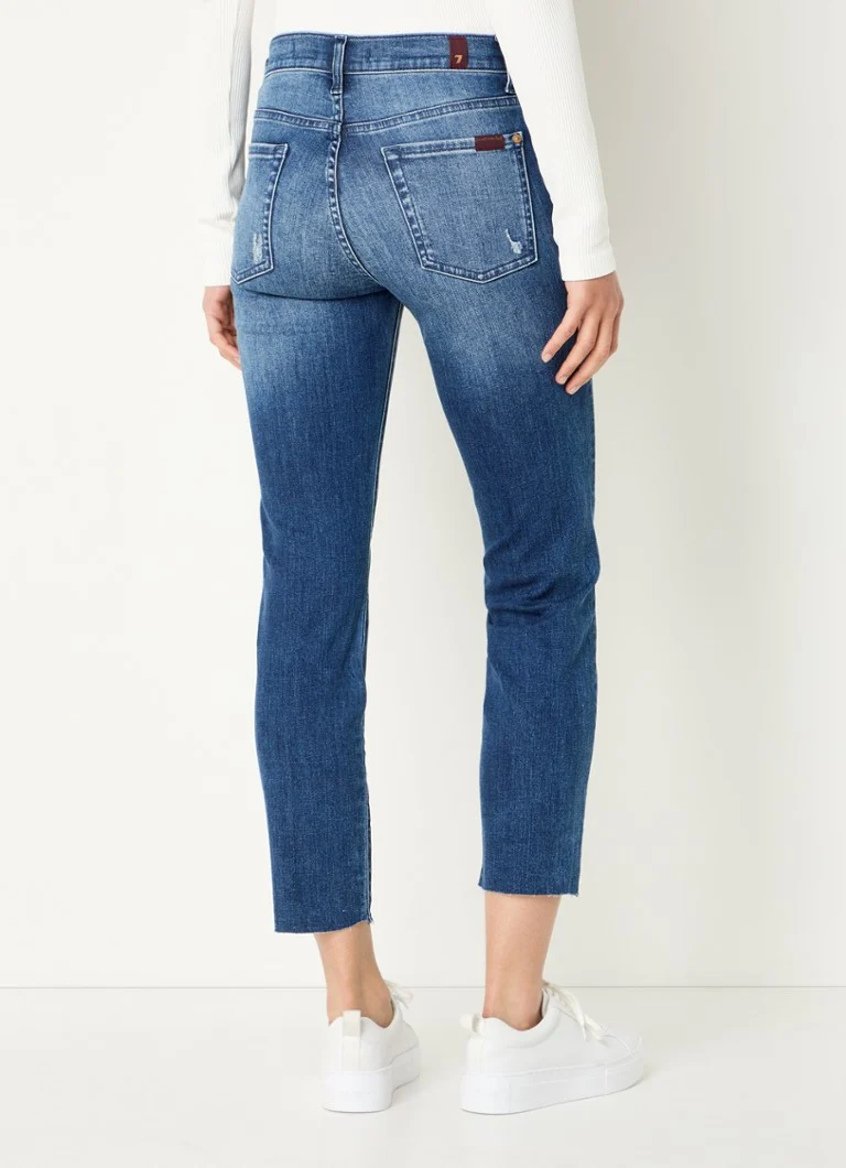 Pantaloni scurți skinny din denim Roxanne cu talie înaltă de la 7 For All Mankind, într-o nuanță medie.