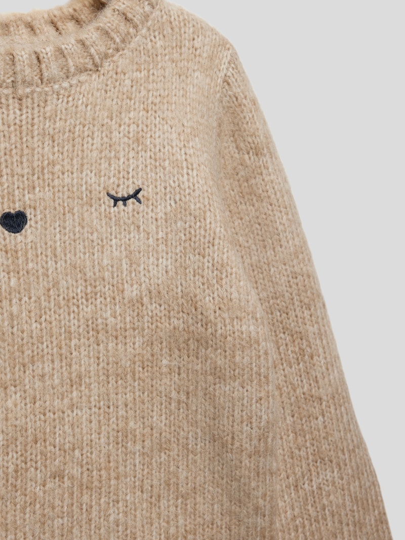 Strickpullover mit Motiv-Stitching in beige