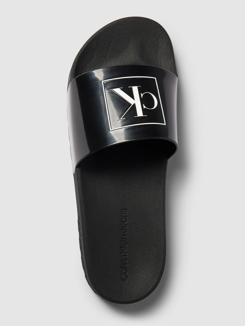 Slides mit Logo-Print Modell 'TRUCK' in schwarz