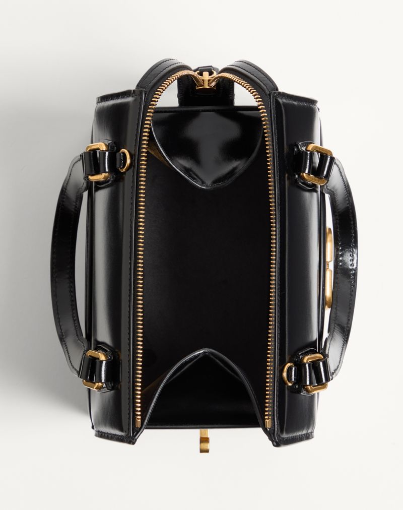 Bolsa Valentino Garavani Vain-Case em couro de bezerro brilhante