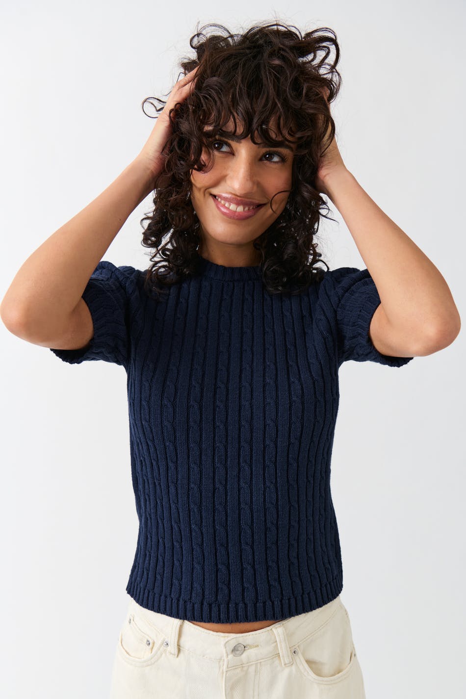 Knitted cable top