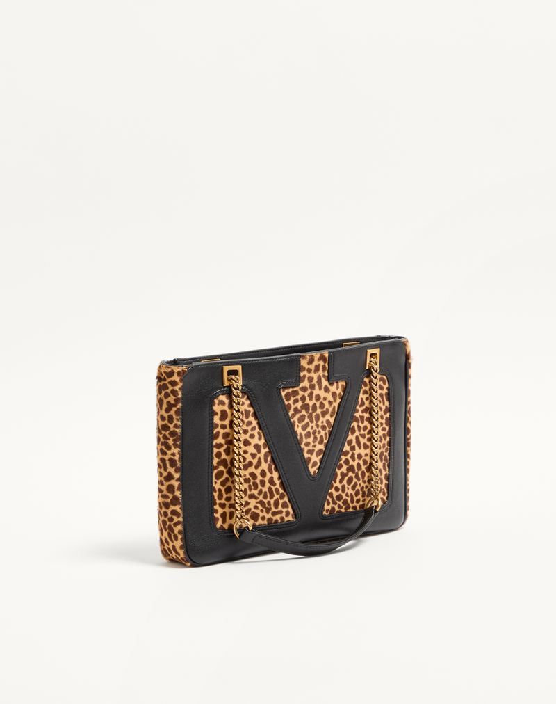 Bolsa pequena Valentino Garavani Viva Superstar em couro de bezerro com efeito pônei.