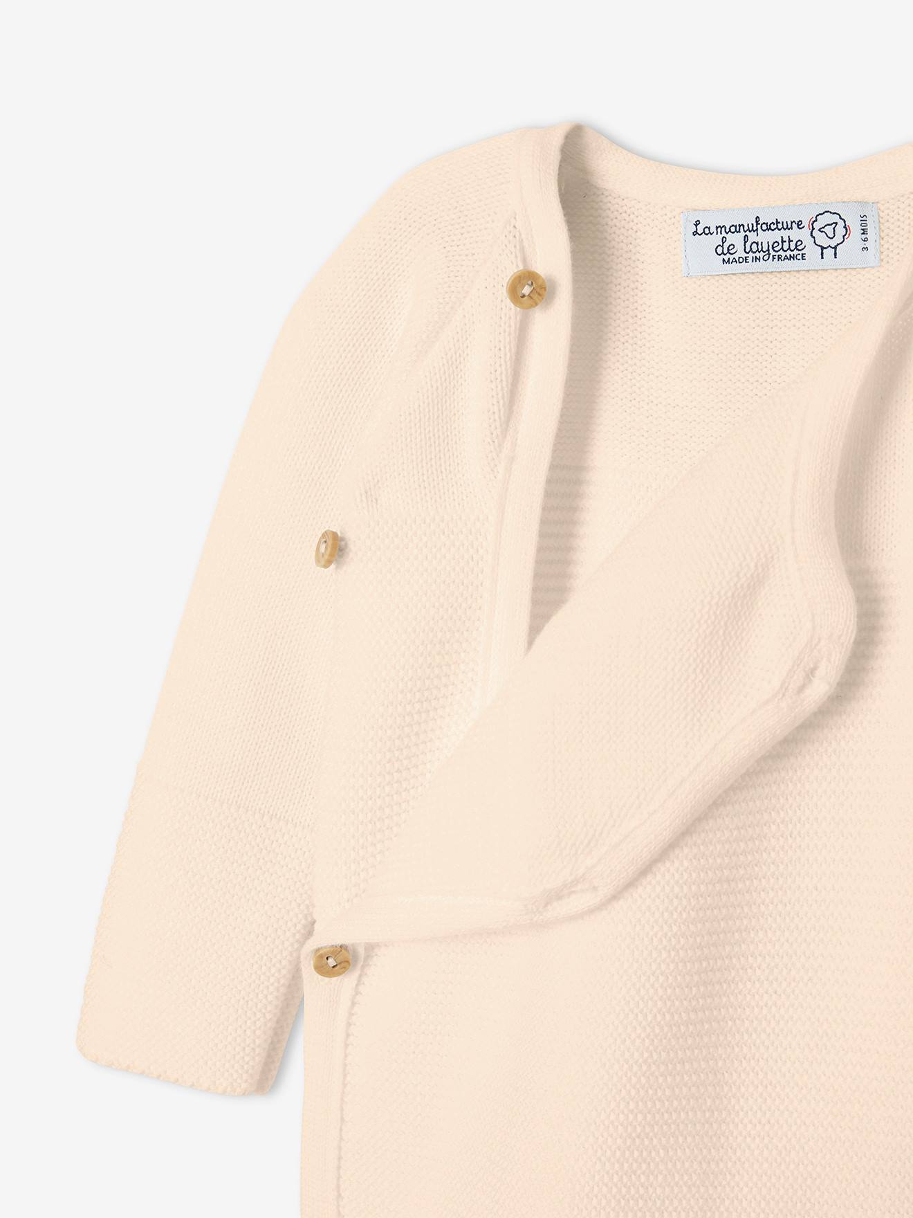 Combinaison bébé en tricot beige clair