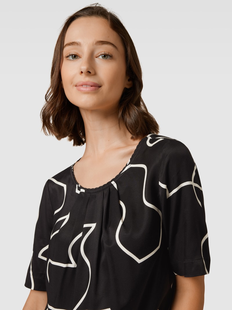 Blusenshirt aus Viskose mit Allover-Muster in schwarz