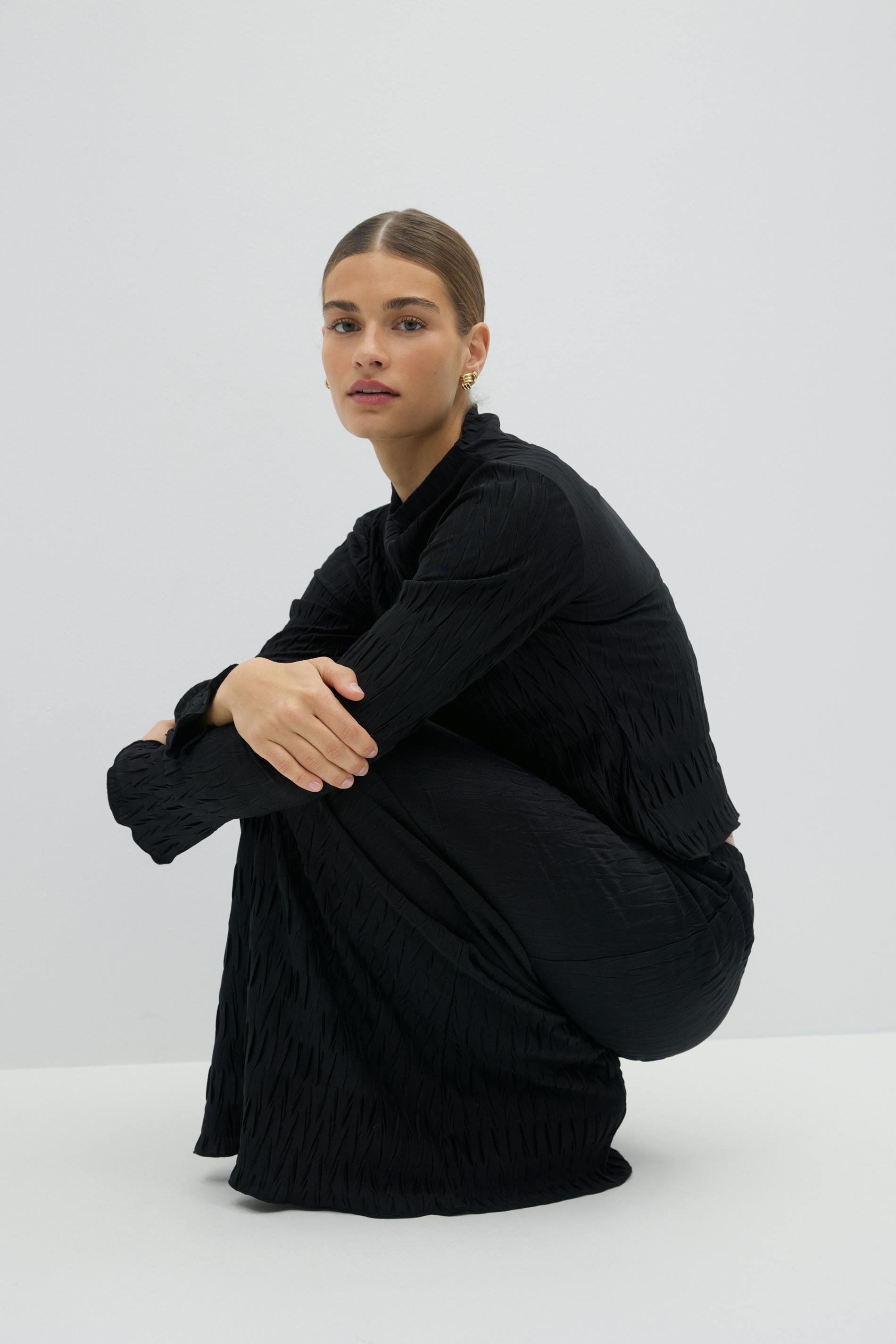 Pleated funnel neck top