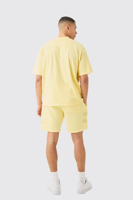 Kastiges zerrissenes Man T-Shirt & Shorts