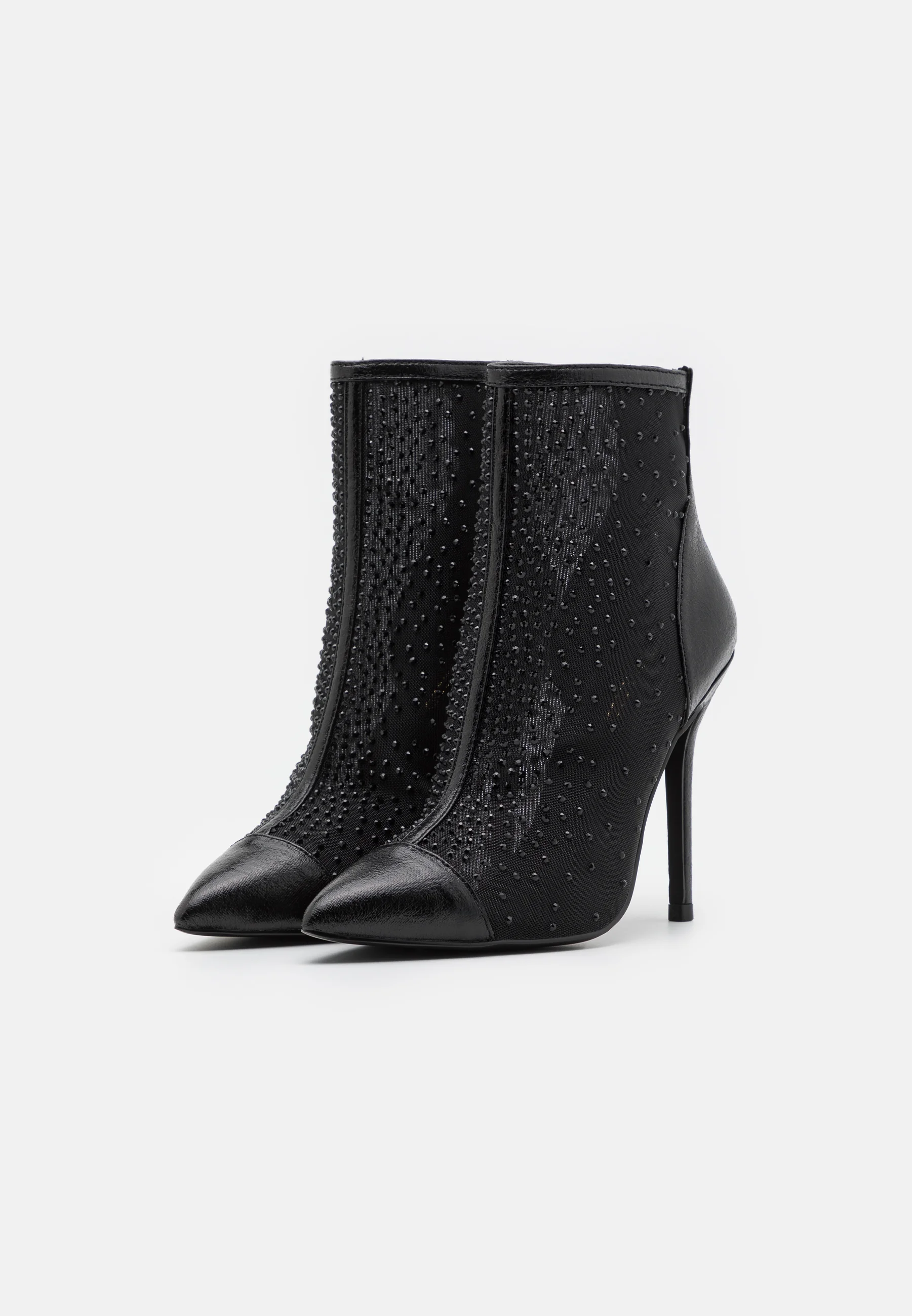 Botines de tacón par e impar