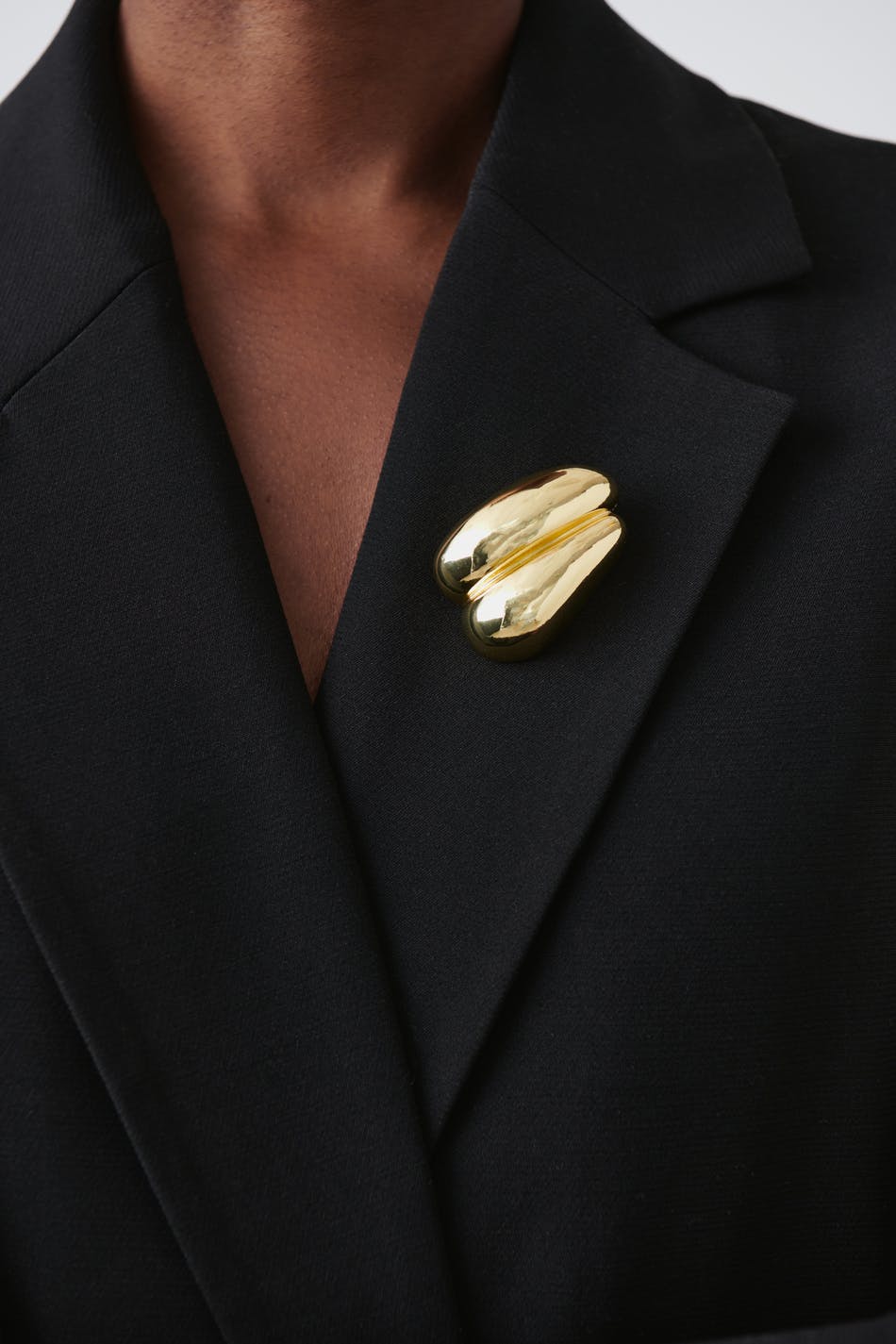 Uneven brooch