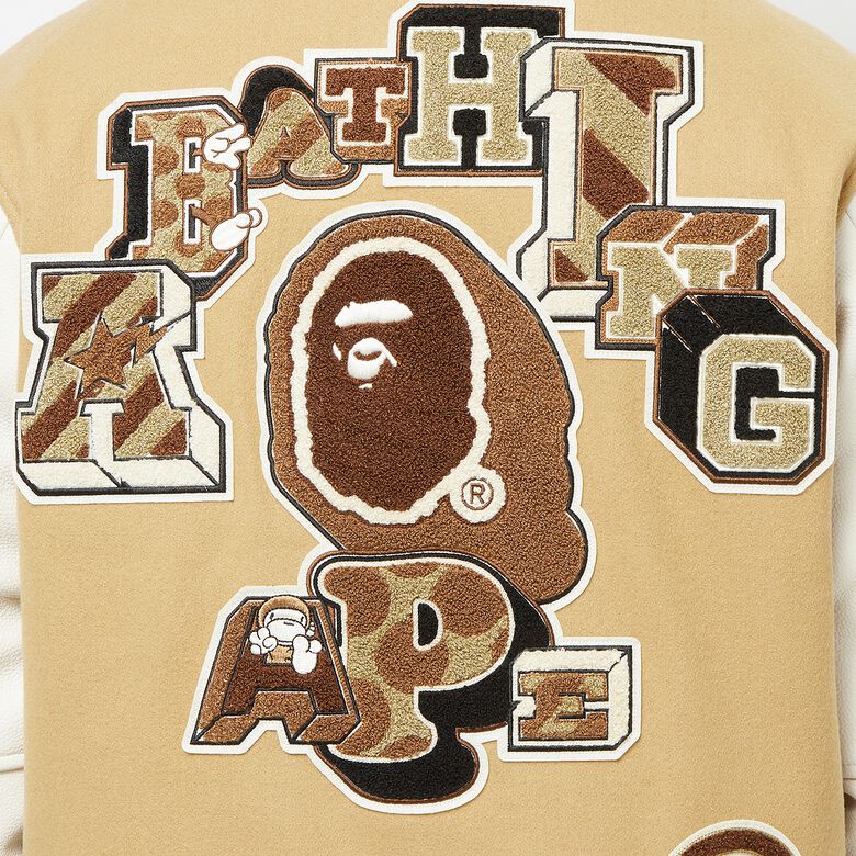 A Bathing Ape Multi Motif Varsity Jacket beige
